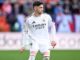 Joueur de football en maillot du Real Madrid.