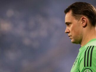 Gardien de but en maillot vert, profil