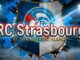 Logo du RC Strasbourg sous projecteurs bleus