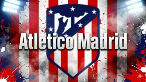 Logo de l’Atlético Madrid sur fond rouge et blanc